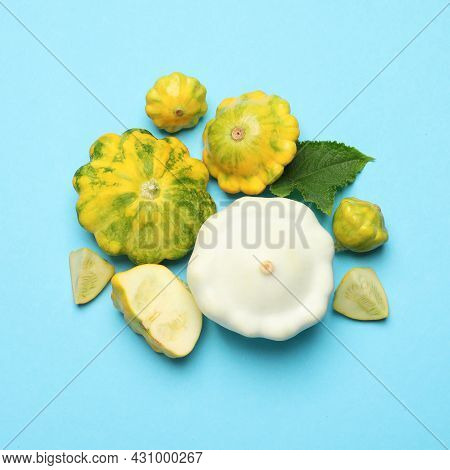 Fresh Ripe Pattypan Squashes On Light Blue Background, Flat Lay