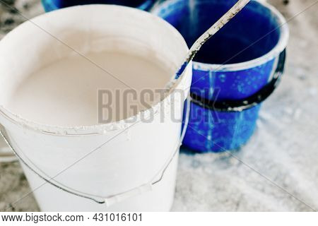 The Concept Of Repair Of The House And Premises. Buckets Of Paint And Lime For Whitewashing And Pain