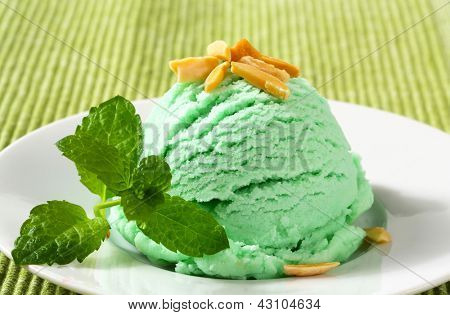 pistachio ice cream sundae sprinkled with almonds