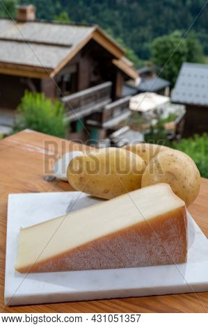 Tastes Of Savoia, French Cow Cheese For Gratin Abondance, Potatoes And French Mountains Village In H