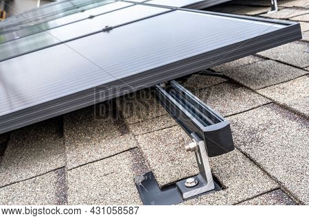 Rail, Bracket, And Anchor To A Solar Panel Installed On A Asphalt Shingle Roof