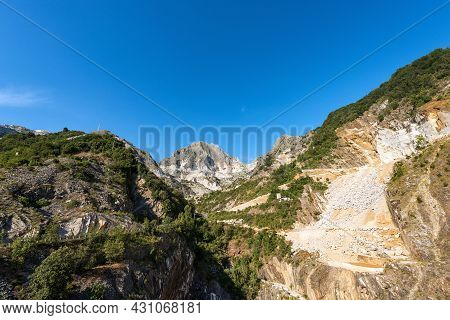 Landscape View Of The Famous White Carrara Marble Quarries On The Apuan Alps. Massa And Carrara Prov