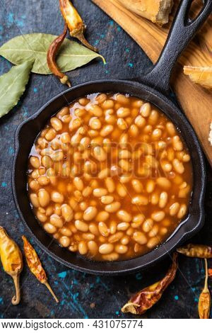 Baked beans, classic american staple food served in a skillet