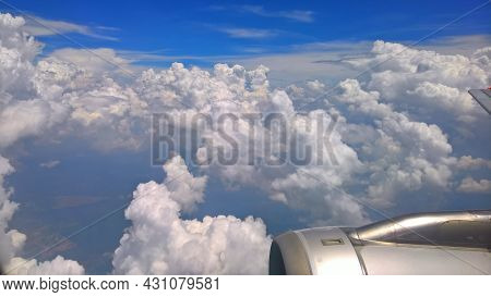 Beautiful White Clouds And Raincloud In Blue Sky View From A Plane, Look Over Pulau Tinggi Island, M