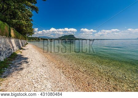 Beautiful Beach On Lake Garda (lago Di Garda) In Front Of The Small Town Of Garda. Promontory Of San