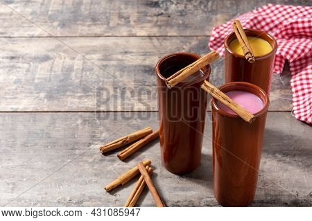 Traditional Mexican Atole Drink On Wooden Table. Copy Space