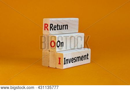 Roi, Return On Investment Symbol. Wooden Blocks With Words 'roi, Return On Investment'. Beautiful Or
