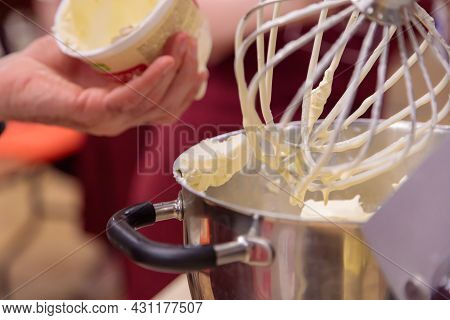 Preparation Of Tiramisu Mascapone Cream, Beat In A Saucepan.