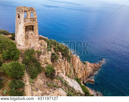 San Gemiliano Tower On The Rocky Coast On The Blue Sea. Sardinia, Italy. City Of Arbatax.