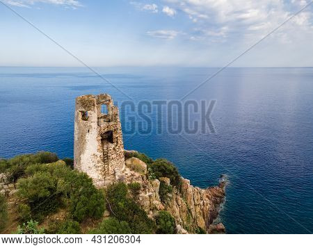San Gemiliano Fortress Tower On The Rocky Coast On The Blue Sea. Sardinia, Italy. City Of Arbatax.