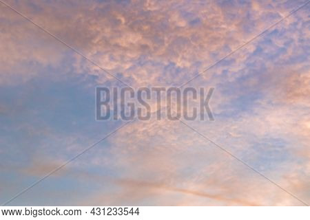 Beautiful Sky Painted By The Sun Leaving Bright Golden Shades.dense Clouds In Twilight Sky In A Summ