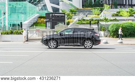 Lexus Rx Third Generation Al10 Is Driving On City Road. Overspeed In City Concept. Black Suv In Moti