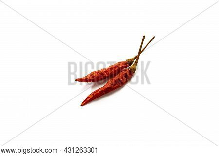 Dry Red Hot Chili Peppers On White Background