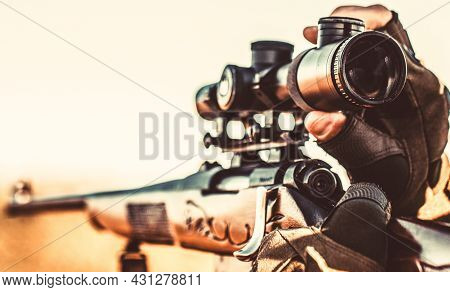 Hunt Hunting Rifle. Hunter Is Aiming. Hunter Man. Shooter Sighting In The Target. Hunting Period. Ma