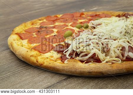 View From Above Of Big Peperoni Pizza And Calabrian. Closeup