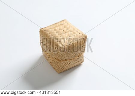 Steamed Sticky Rice Is In Bamboo Container On White Background.