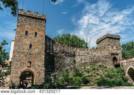 Old Stone Gate To Bitov Castle On Steep Promontory Towering Above Meandering River Zeletavka,czech R
