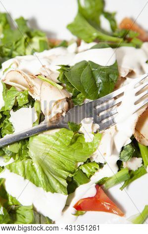 Romaine Lettuce, Tomato, And Chicken Lunchmeat Drizzled In Ranch Dressing