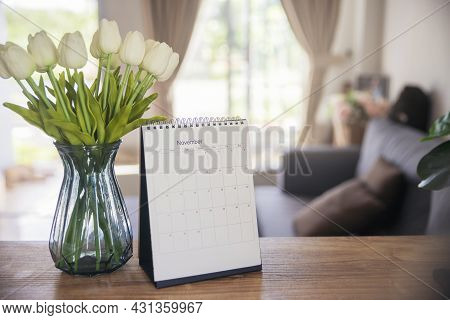 Calendar Desk And Flower On Table In Living Room. Desktop Calender For Planner To Plan Agenda, Timet