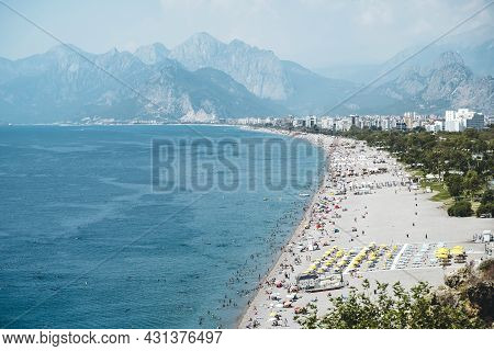 Konyaalti Beach In Antalya, Turkey. Long Turkish Beach On The Mediterranean Sea In Warm Sunny Summer