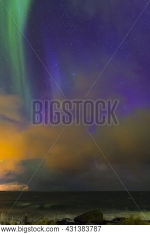 Picturesque Aurora Borealis Lights Also Known As Nother Lights Playing With  Colors At Lofoten Islan