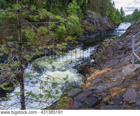 Kivach Waterfall  In The Forest Of Karelia. Russian Landscape In Summer