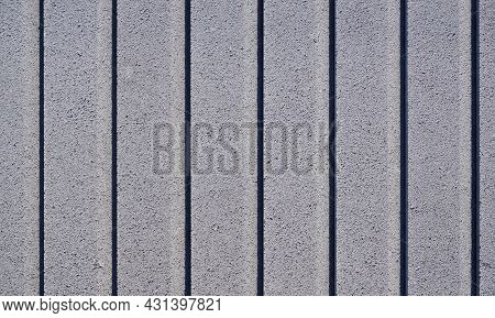 Vibro-pressed Concrete Curb On A Pallet. Concrete Gray Curb Surface.