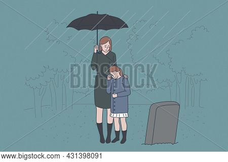 Family Grief And Loss Concept. Sad Crying Mother And Daughter Standing On Cemetery Near Fathers Grav