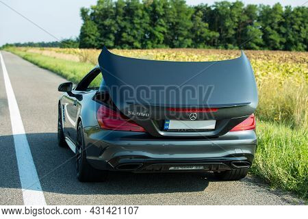Dnepropetrovsk, Ukraine - 08.24.2021: Photos Of A Mercedes Benz Sl550 Convertible On The Road. Conve