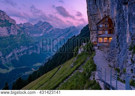 Swiss Alps And A Mountain Restaurant Under The Aescher Cliff Viewed From Mountain Ebenalp In The App