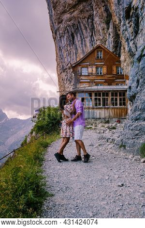 Swiss Alps And A Mountain Restaurant Under The Aescher Cliff Viewed From Mountain Ebenalp In The App