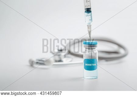 Syringe With Liquid Vaccines Booster. Fight Against Virus Covid-19 Coronavirus, Vaccination And Immu