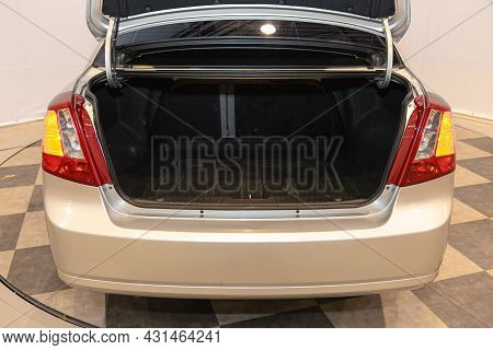 Novosibirsk, Russia - July 28, 2021: Chevrolet Lacetti, Close-up Of The Open Trunk, Headlight, Bumpe