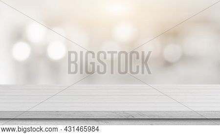 White Wood Table Top Over Blur Bokeh Light Background. White  Wooden Counter, Desk, Shelf For Produc