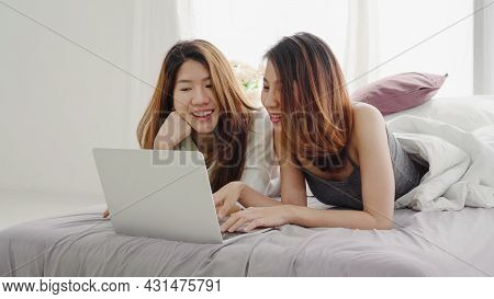 Beautiful Young Asian Women Lgbt Lesbian Happy Couple Sitting On Bed Hug And Using Laptop Computer T