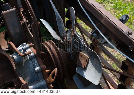 Close-up Of Rusty Engine Of An Old Car With Big Ventilator