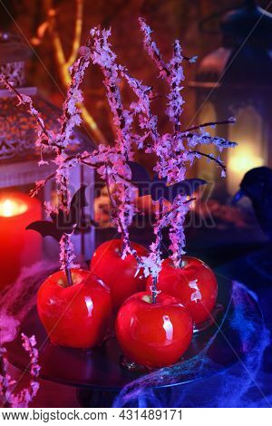 Halloween Dessert. Poisoned Blood Caramelized Glazed Candy Apple. Snow White Poison Lollipops.