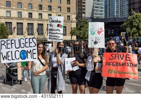 Downtown Vancouver, British Columbia, Canada - August 28, 2021: Crowd Of People Protesting Against T