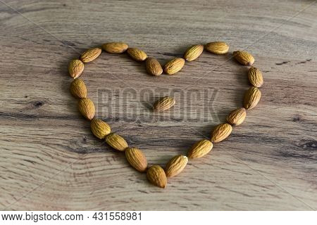 Almonds Lying On The Table In The Form Of A Heart