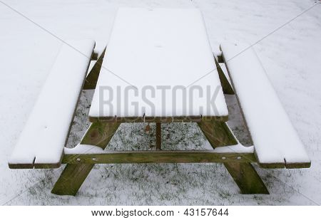 Picknick Table Covered In Snow