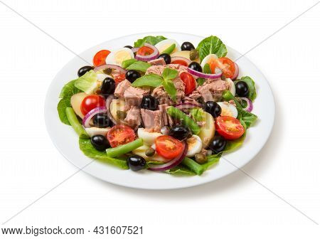 Nicoise Salad With Tuna, Tomatoes, Lettuce, Olives In A White Plate Isolated On White Background. Cl