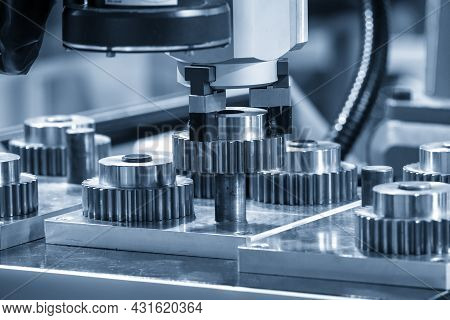 The Hi-technology  Material Handling Process By Robotic System With Metal Gear Parts. The Automatic 