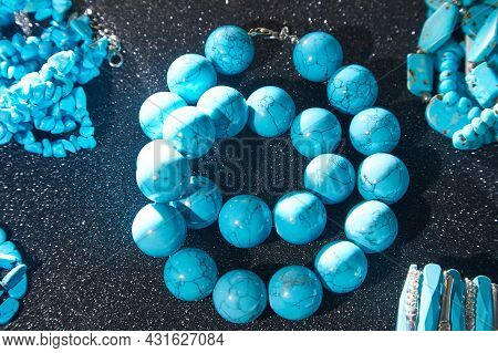 Beautiful Blue Beads. The Concept Of A Beautiful, Elegant Life And Beautiful Decoration For Woman