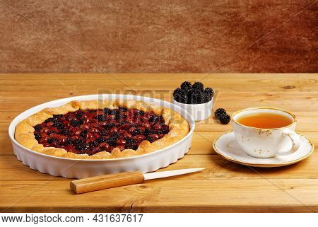 Homemade Open Pie Gallet With Raspberries, Blackberry And Grapes. Copyspace.