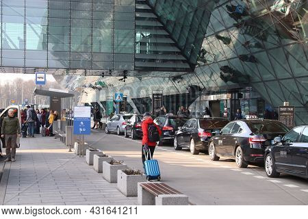 Krakow, Poland - December 11, 2019: Passengers Visit Krakow Airport In Poland. It Is The Second Busi