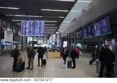 Krakow, Poland - December 11, 2019: Passengers Visit Krakow Airport In Poland. It Is The Second Busi