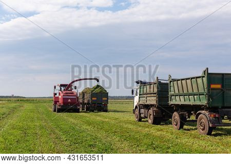 Combine Harvesting A Green Field