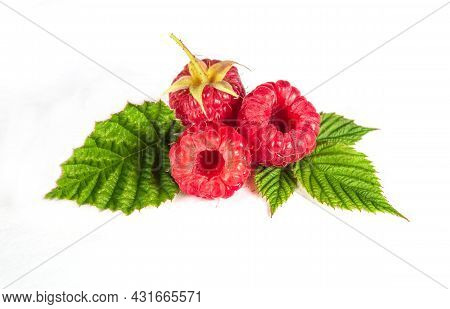 Raspberry Isolated. Raspberries With Leaf Isolate. Raspberry With Leaf Isolated On White