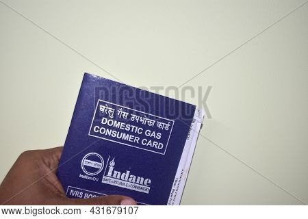 Jhargram, India; August, 23, 2021: A Domestic Gas Consumer Booking Card Of Indian Oil. Indane Gas Bo