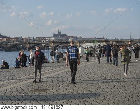 Prague, Czech Republic, March 26, 2021: The Embankment Of River Vltava Called Naplavka, With Crowd O